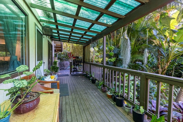 wooden deck featuring a pergola