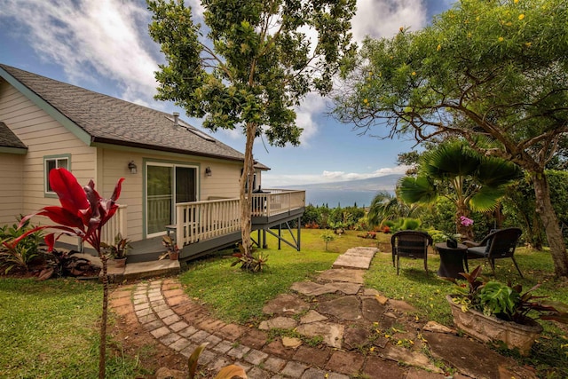 view of yard with a deck