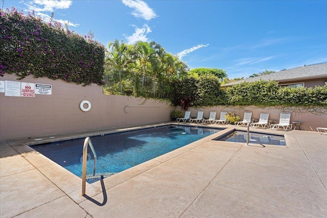 view of pool with a patio area