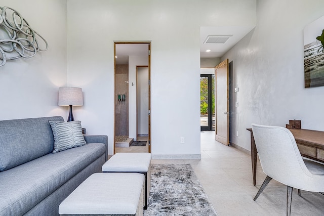 living room with light tile patterned flooring