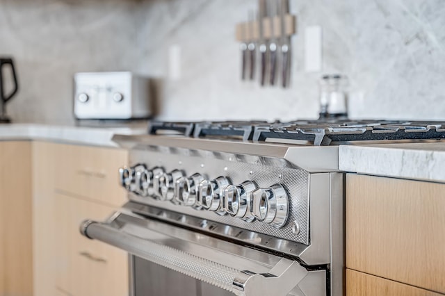 exterior details featuring light brown cabinetry