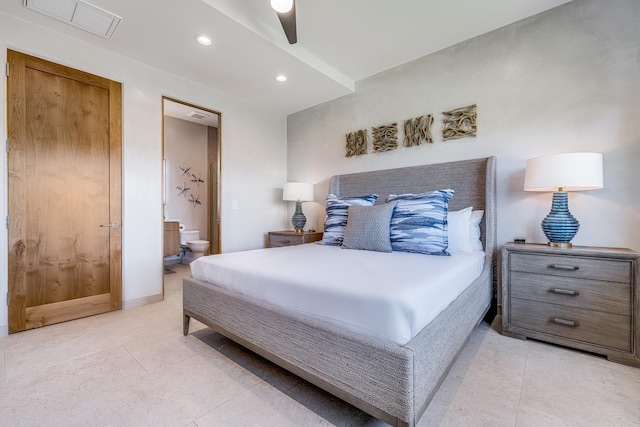 tiled bedroom with ceiling fan and ensuite bathroom