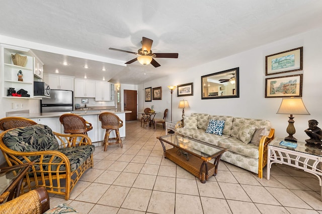 3975 Lower Honoapiilani Rd Unit 107, Lahaina, HI 96761 - living area featuring light tile patterned floors and ceiling fan