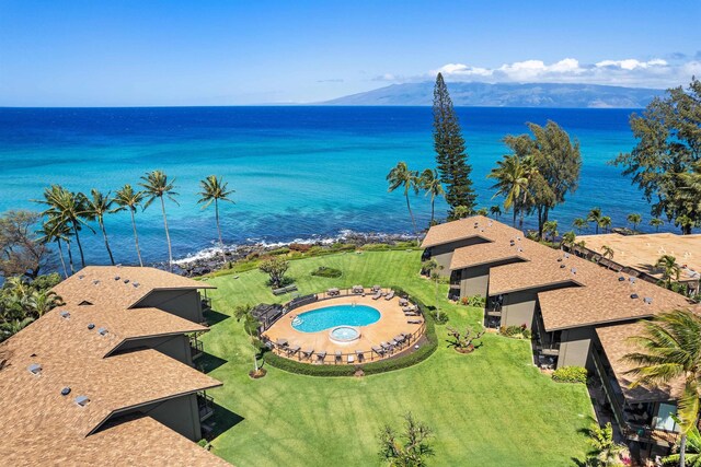 3975 Lower Honoapiilani Rd Unit 107, Lahaina, HI 96761 - drone / aerial view of a large body of water and a pool area