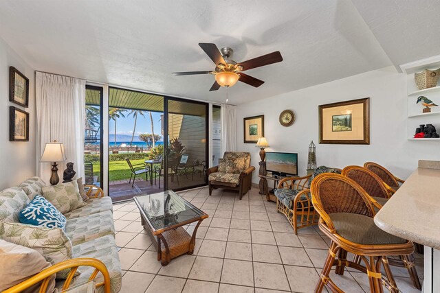 3975 Lower Honoapiilani Rd Unit 107, Lahaina, HI 96761 - living area with ceiling fan and light tile patterned flooring