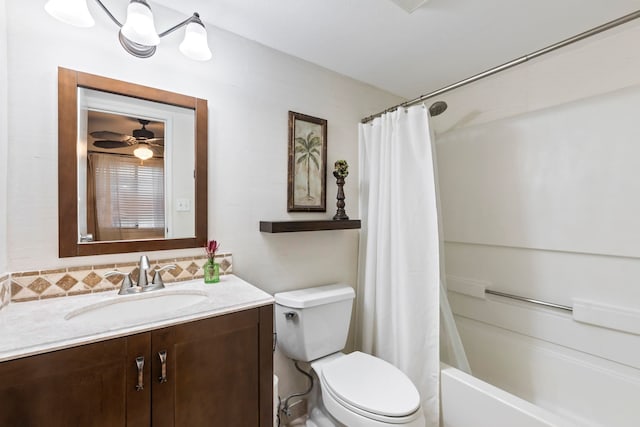 full bathroom featuring vanity, ceiling fan, toilet, and shower / bathtub combination with curtain