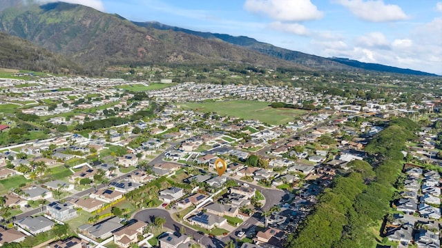 birds eye view of property with a residential view and a mountain view