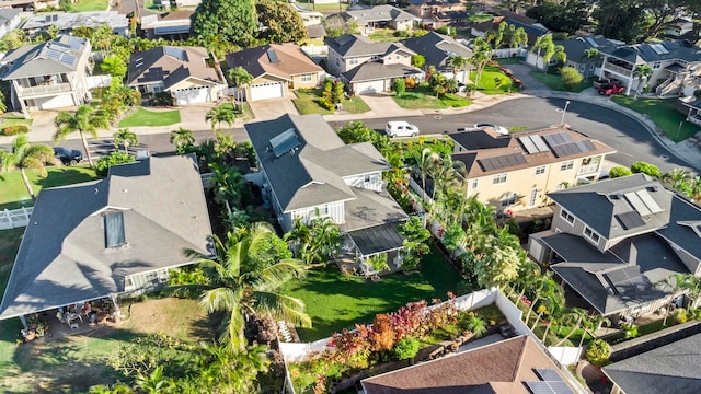 birds eye view of property with a residential view