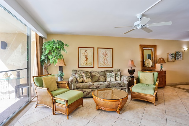 tiled living room featuring ceiling fan