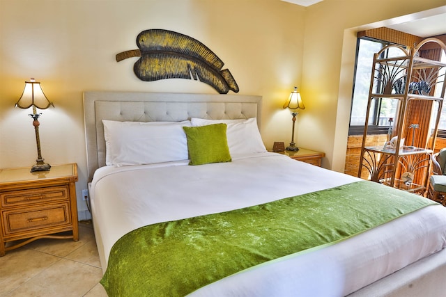 bedroom featuring light tile patterned floors