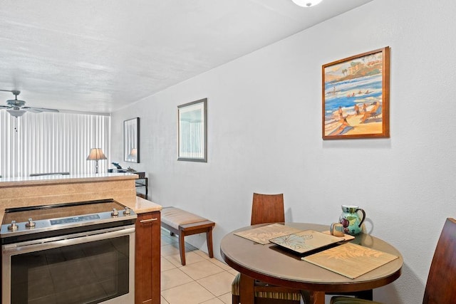 111 Kahului Beach Rd Unit D306, Kahului, HI 96732 - dining space with light tile patterned flooring and a ceiling fan