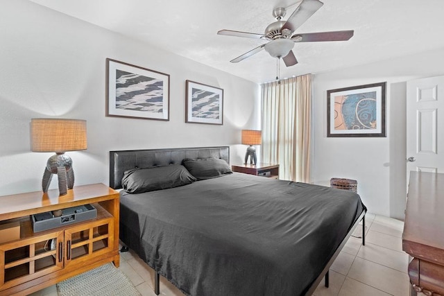 111 Kahului Beach Rd Unit D306, Kahului, HI 96732 - bedroom with light tile patterned floors and ceiling fan