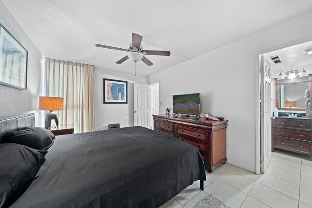 111 Kahului Beach Rd Unit D306, Kahului, HI 96732 - bedroom featuring light tile patterned floors and a ceiling fan