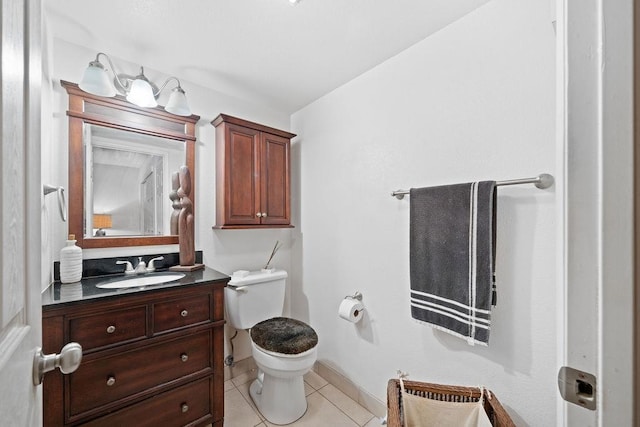 111 Kahului Beach Rd Unit D306, Kahului, HI 96732 - bathroom with tile patterned floors, toilet, vanity, and baseboards