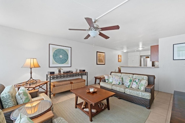 111 Kahului Beach Rd Unit D306, Kahului, HI 96732 - living area with light tile patterned floors and ceiling fan