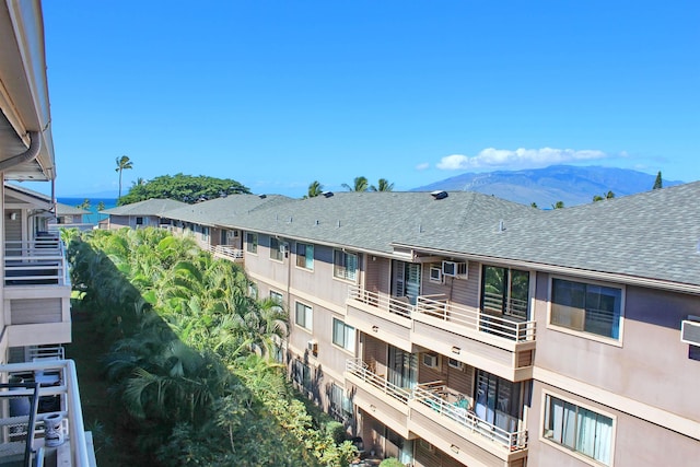 view of building exterior with a mountain view