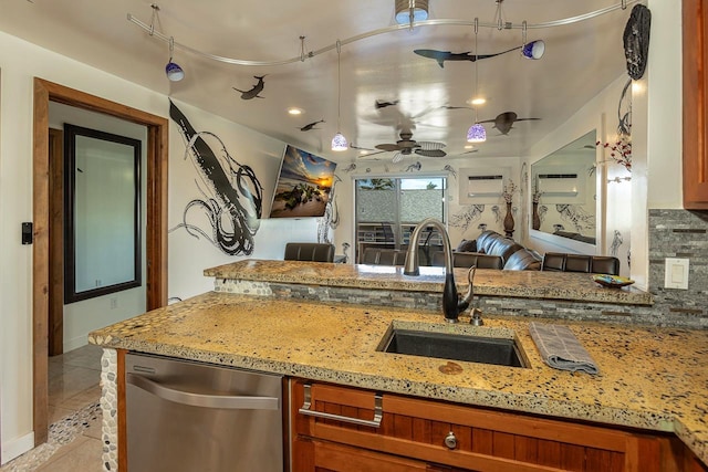 2747 S Kihei Rd Unit H208, Kihei, HI 96753 - kitchen featuring dishwasher, a sink, brown cabinets, open floor plan, and a ceiling fan