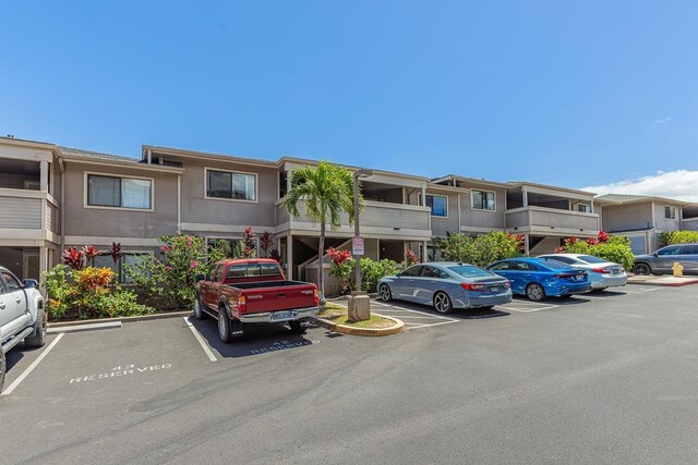 2747 S Kihei Rd Unit H208, Kihei, HI 96753 - view of building exterior with uncovered parking