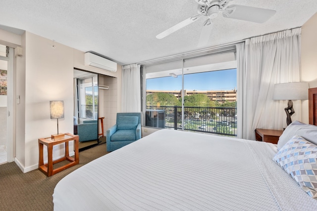 carpeted bedroom featuring ceiling fan, a textured ceiling, access to exterior, and a wall mounted air conditioner