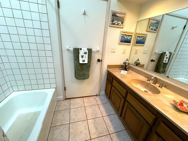 bathroom featuring tile flooring and oversized vanity