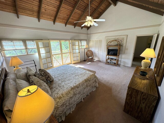 bedroom featuring ceiling fan, beam ceiling, carpet, wooden ceiling, and french doors