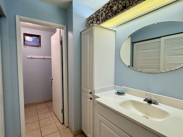 bathroom featuring vanity and tile patterned floors