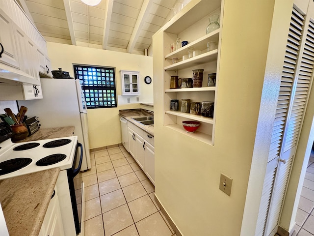 kitchen featuring lofted ceiling with beams, white cabinetry, light tile patterned floors, wooden ceiling, and electric stove