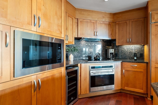 kitchen with beverage cooler, built in microwave, stainless steel oven, black electric stovetop, and tasteful backsplash