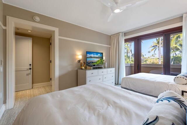 bedroom with access to exterior, baseboards, light wood-type flooring, and ceiling fan