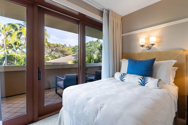 bedroom featuring tile patterned floors and multiple windows