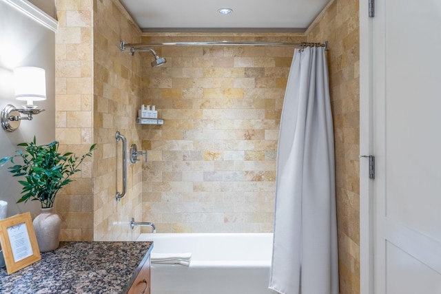 bathroom featuring vanity and shower / tub combo