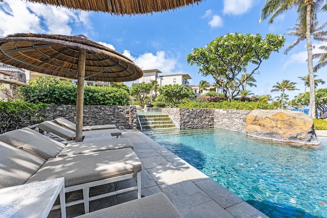 pool with a patio