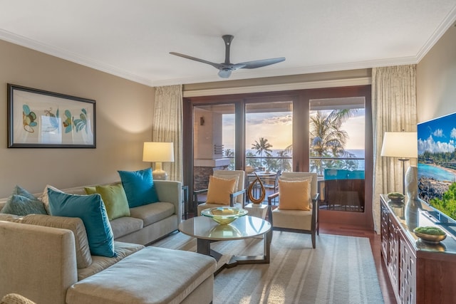 living area featuring crown molding, wood finished floors, and ceiling fan