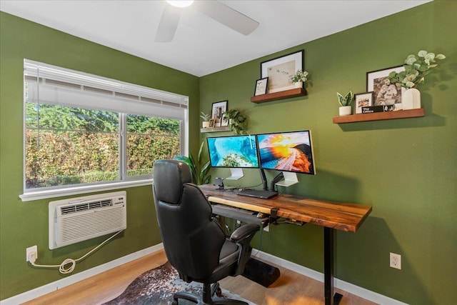 56 Kihalani St Unit 1203, Kihei, HI 96753 - office area featuring wood finished floors, a ceiling fan, baseboards, and an AC wall unit