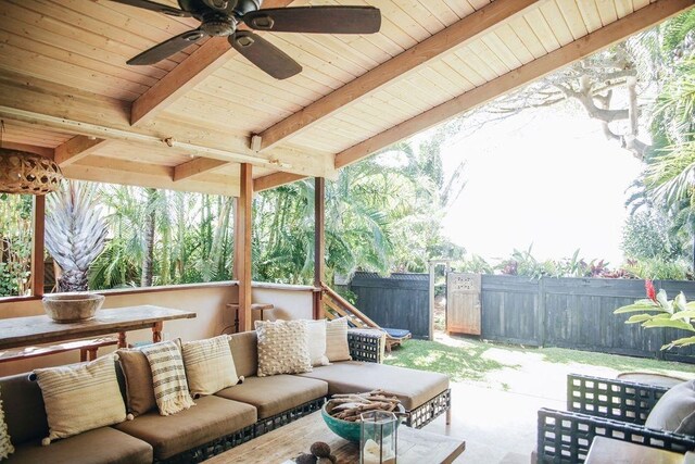 view of patio with ceiling fan and an outdoor living space