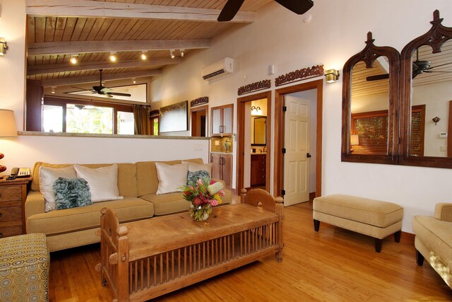 living room featuring hardwood / wood-style flooring, wooden ceiling, ceiling fan, a wall mounted air conditioner, and lofted ceiling with beams