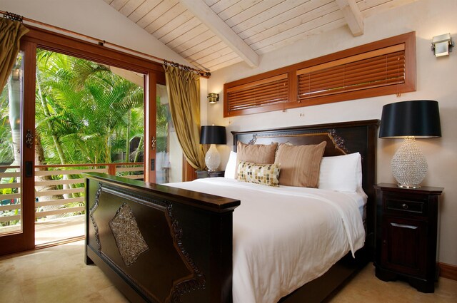 bedroom featuring access to exterior, lofted ceiling with beams, and wood ceiling