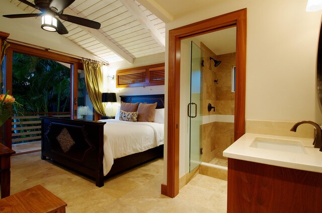 bedroom featuring ceiling fan, wood ceiling, lofted ceiling with beams, and sink