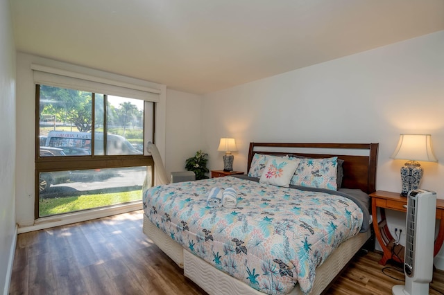 bedroom featuring dark hardwood / wood-style floors