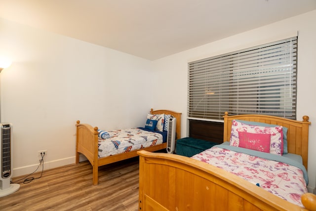 bedroom featuring hardwood / wood-style flooring