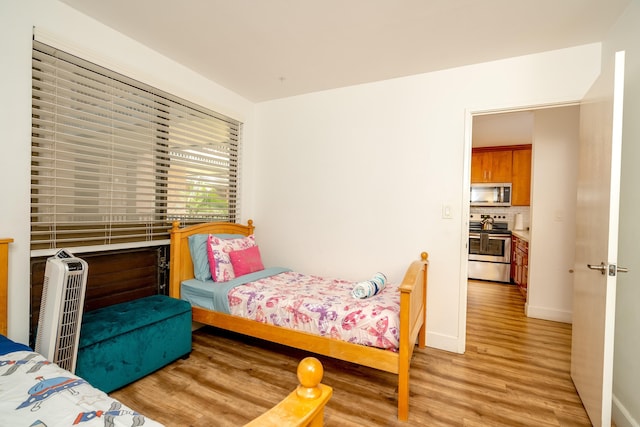 bedroom featuring light hardwood / wood-style floors