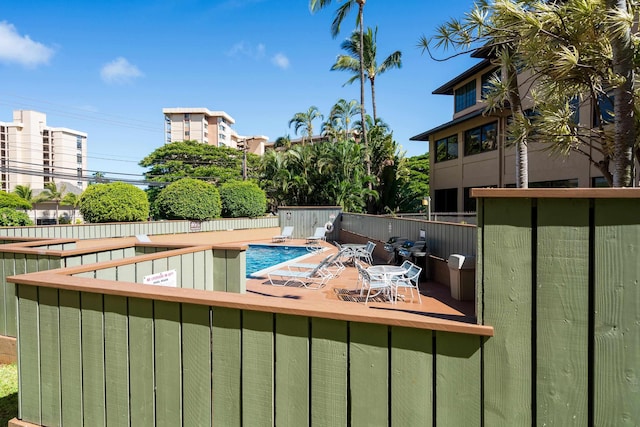 view of swimming pool with a patio area