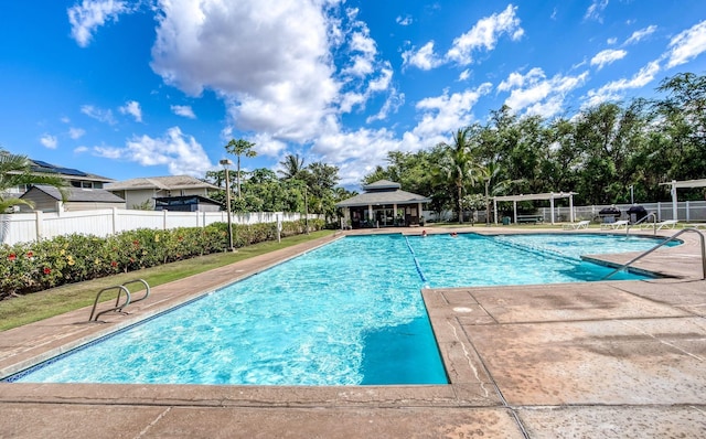 view of swimming pool with a gazebo and a pergola