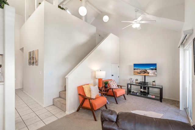 tiled living room featuring beam ceiling, high vaulted ceiling, and ceiling fan