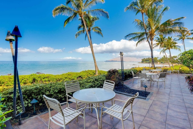 2142 Iliili Rd Unit 303, Kihei, HI 96753 - view of patio featuring outdoor dining area and a water view