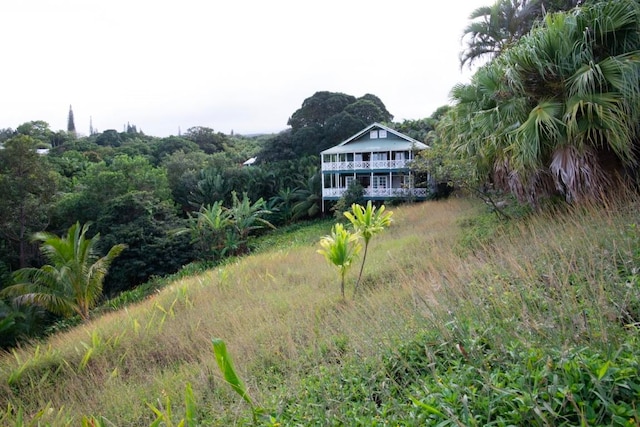 rear view of house with driveway