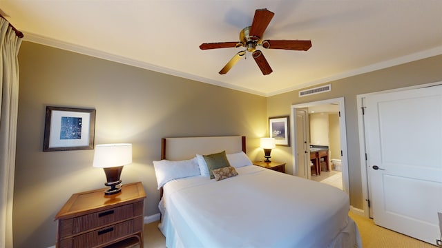 bedroom featuring light colored carpet, connected bathroom, crown molding, and ceiling fan