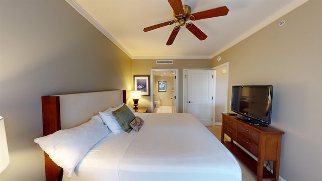 bedroom with ceiling fan, carpet, crown molding, and ensuite bath