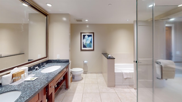 full bathroom with tile patterned floors, toilet, independent shower and bath, and vanity