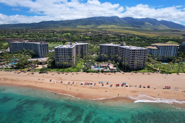 aerial view with a beach view and a mountain view